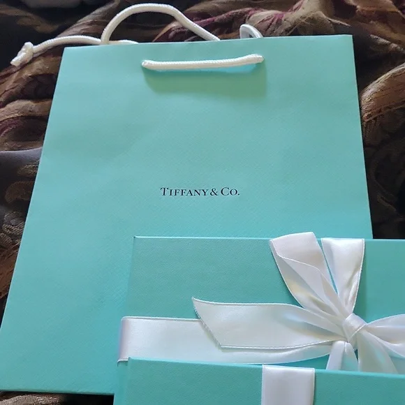 Tiffanys 715 eachor all new bags boxesshown above new my collection